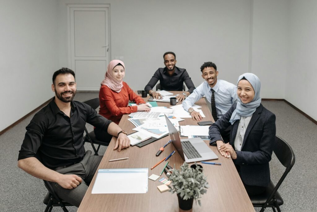 A diverse group of professionals collaborating in a modern office setting.